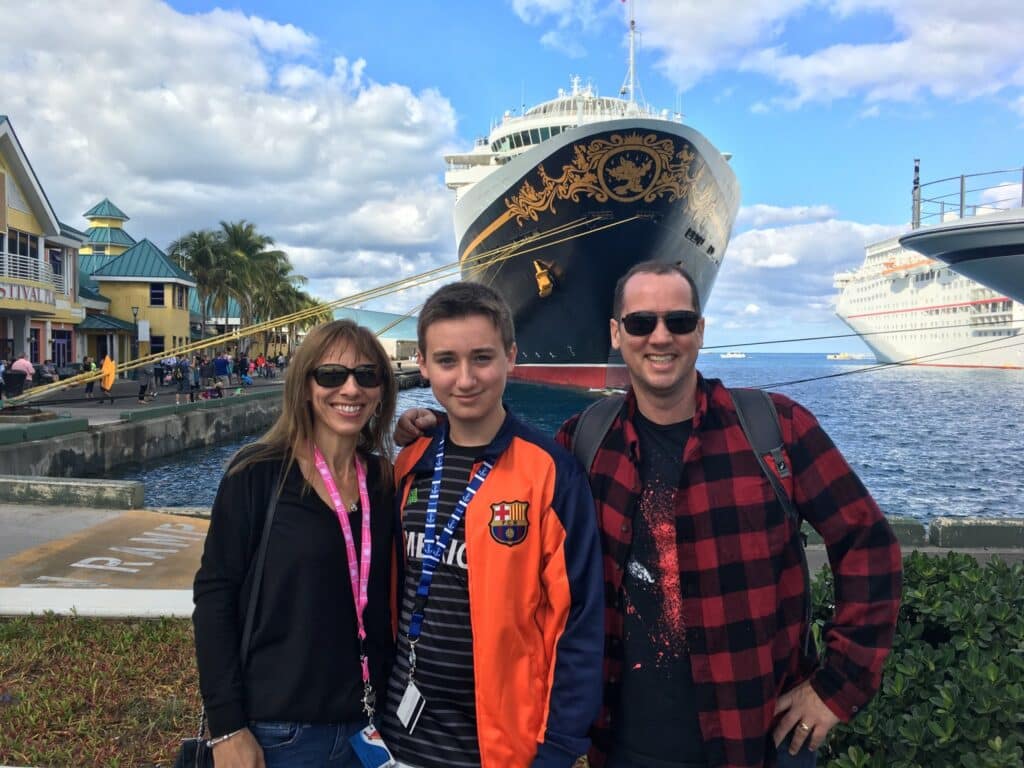 Michael-Rassel-with-wife-son-cruise